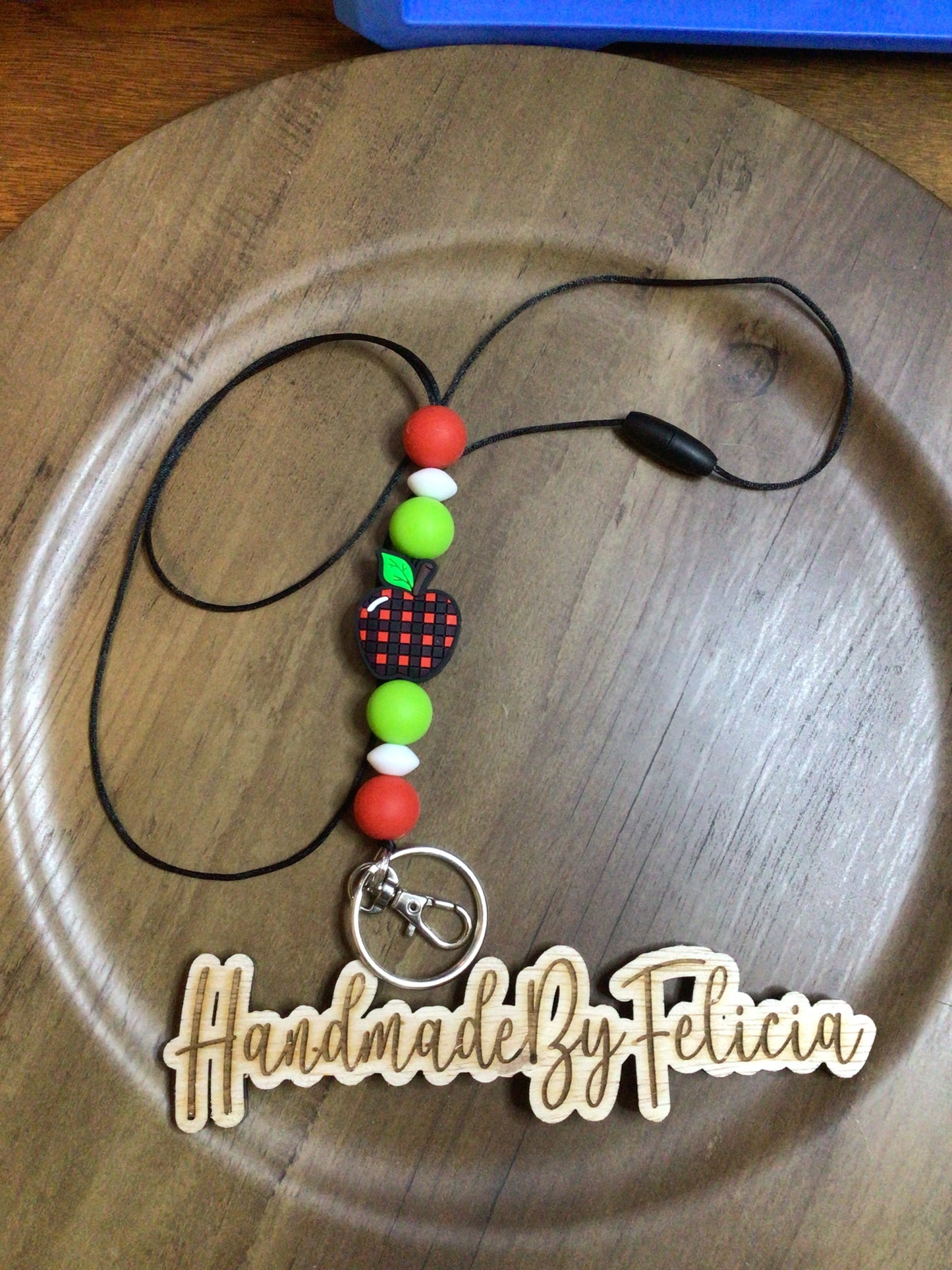 Apple lanyard in green and red