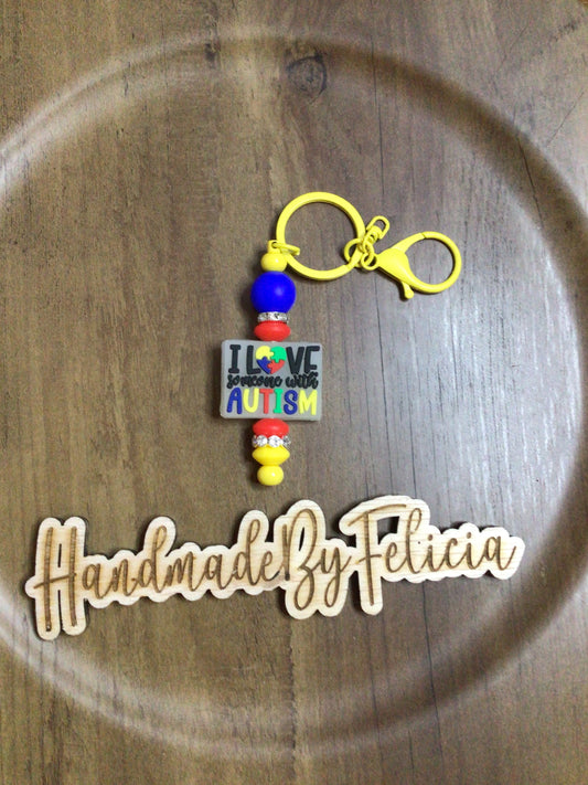 Autism love keychain yellow