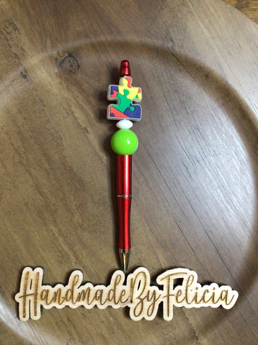 Autism red puzzle pen