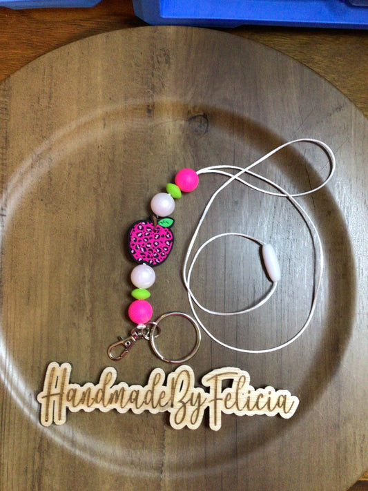 Pink and green apple lanyard