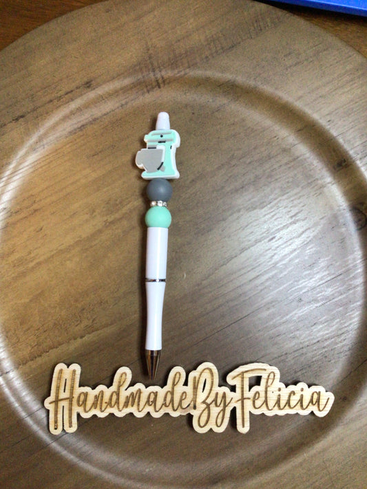 Teal and grey mixer white pen