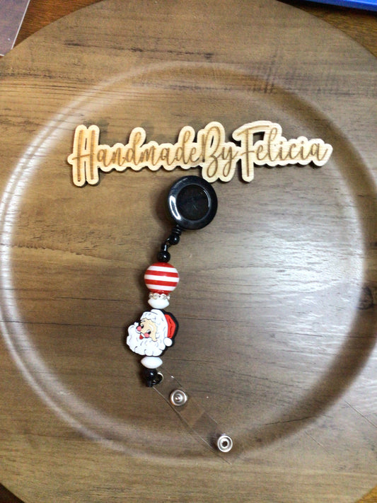 Santa head badge reel black