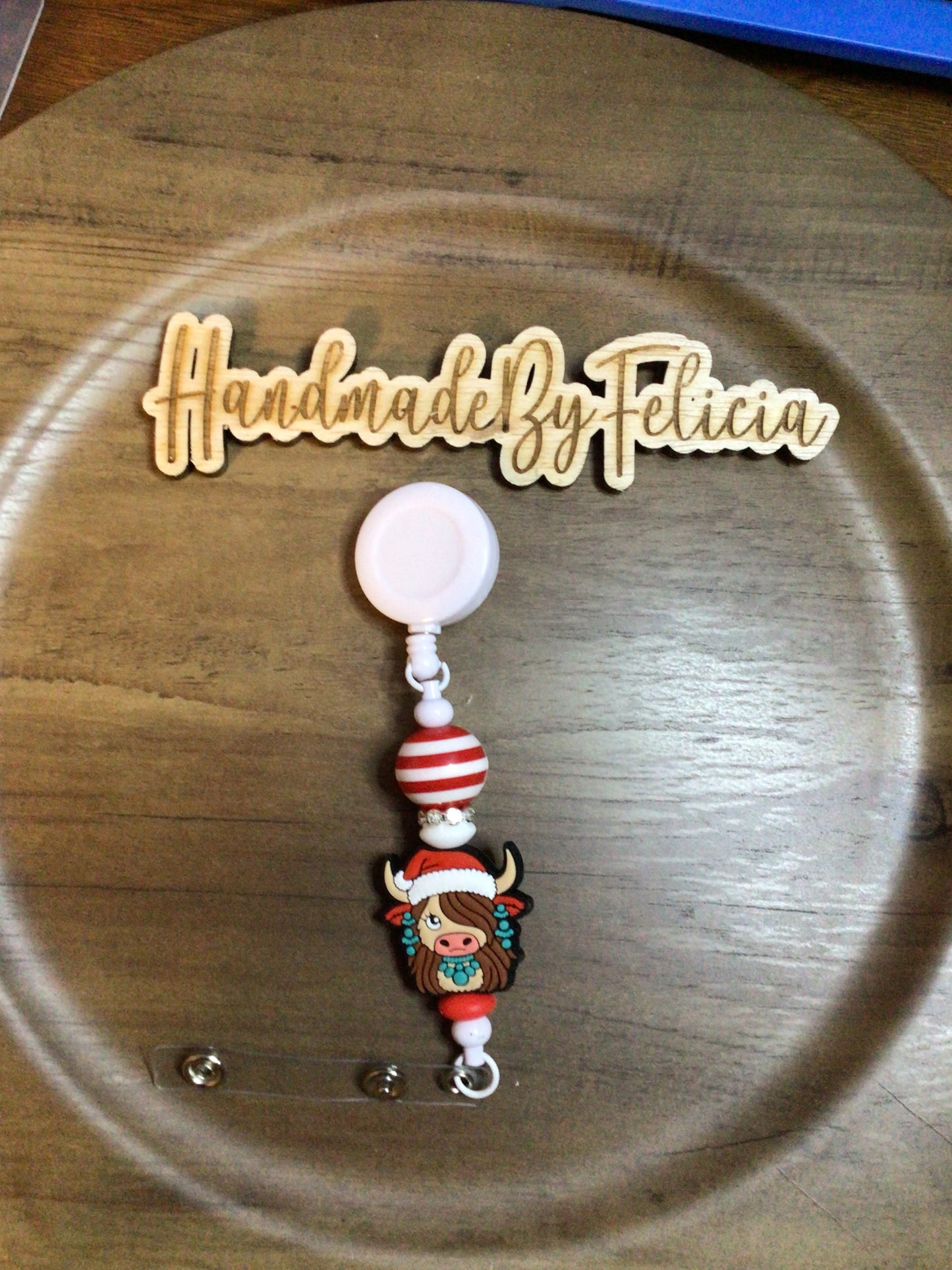 Heifer Santa hat badge reel white