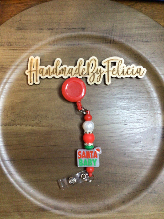 Santa baby badge reel red white